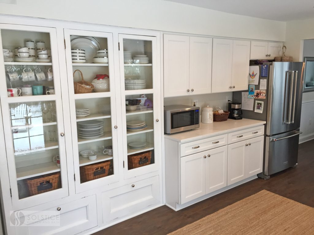 glass front kitchen storage with containers