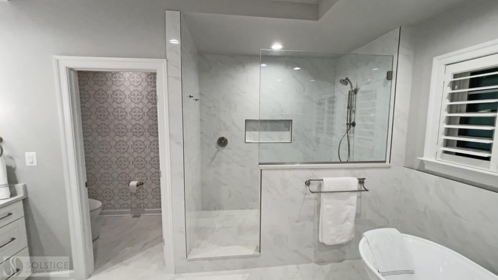 large shower and freestanding tub