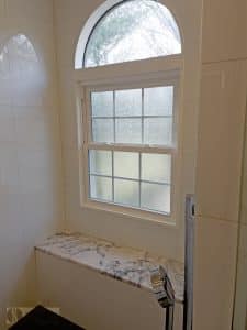 bath design with large window