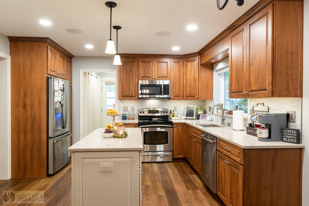 Luxury Vinyl vs. Hardwood Flooring for Kitchen and Bath Design